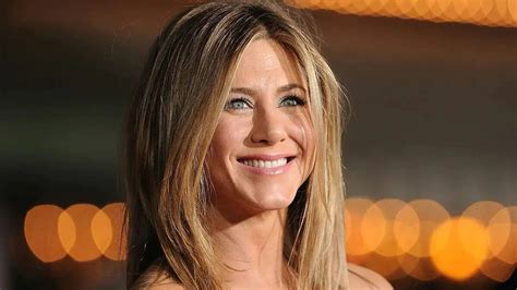 Jennifer Aniston, 52, wows in a white bikini and fans are blown .